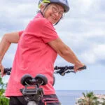 Older woman riding a bicycle